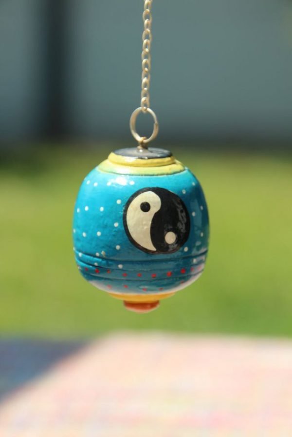 Pendule en bois peint Yin & Yang